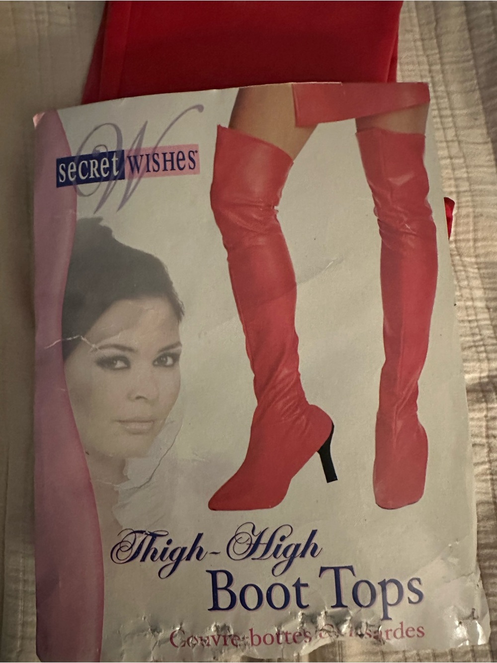 Thigh-high red boots tops